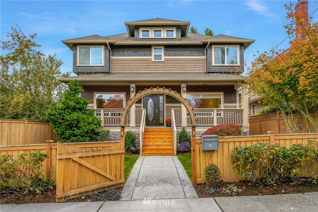 110 N 50th Street Seattle, WA 98103 - Photo 1 of 25 a front view of a house with a yard
