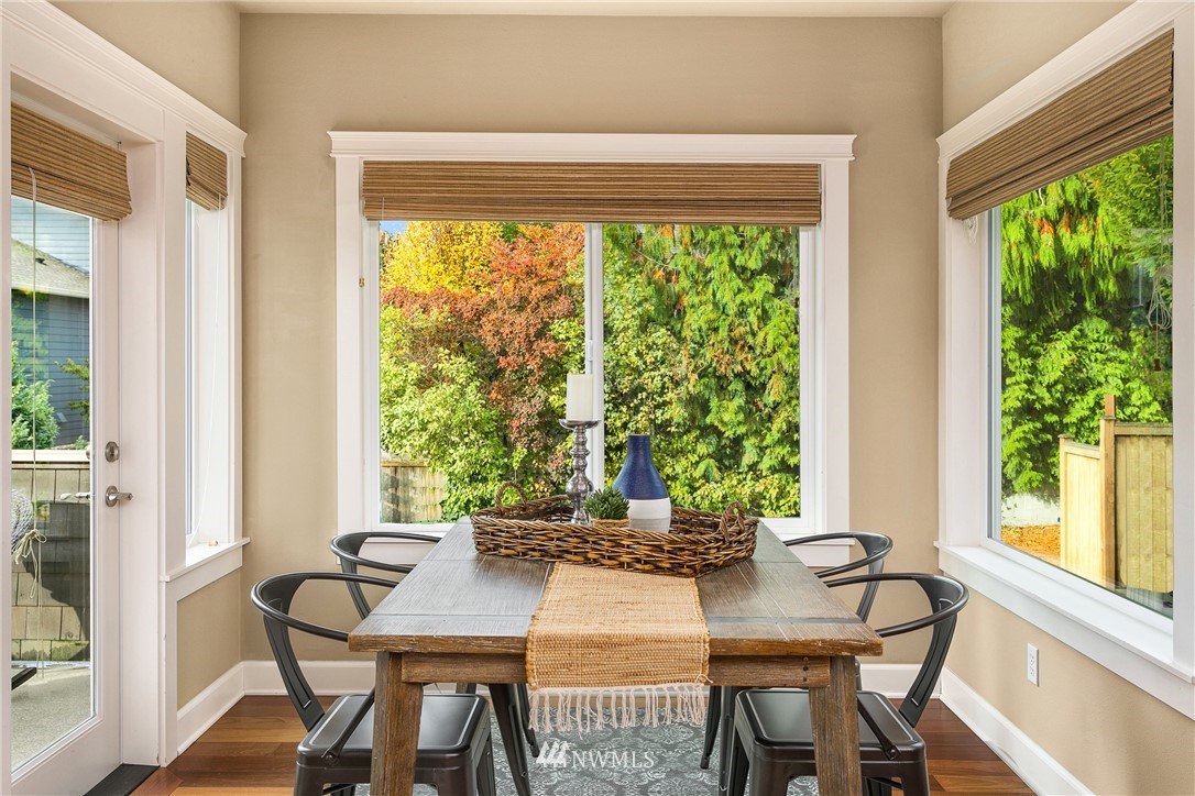 110 N 50th Street Seattle, WA 98103 - Photo 11 of 25 a view of a dining room with furniture window and outside view