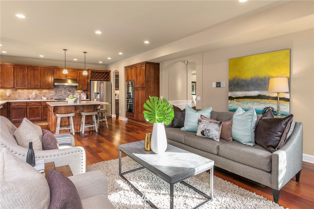 110 N 50th Street Seattle, WA 98103 - Photo 13 of 25 a living room with furniture kitchen view and a large window