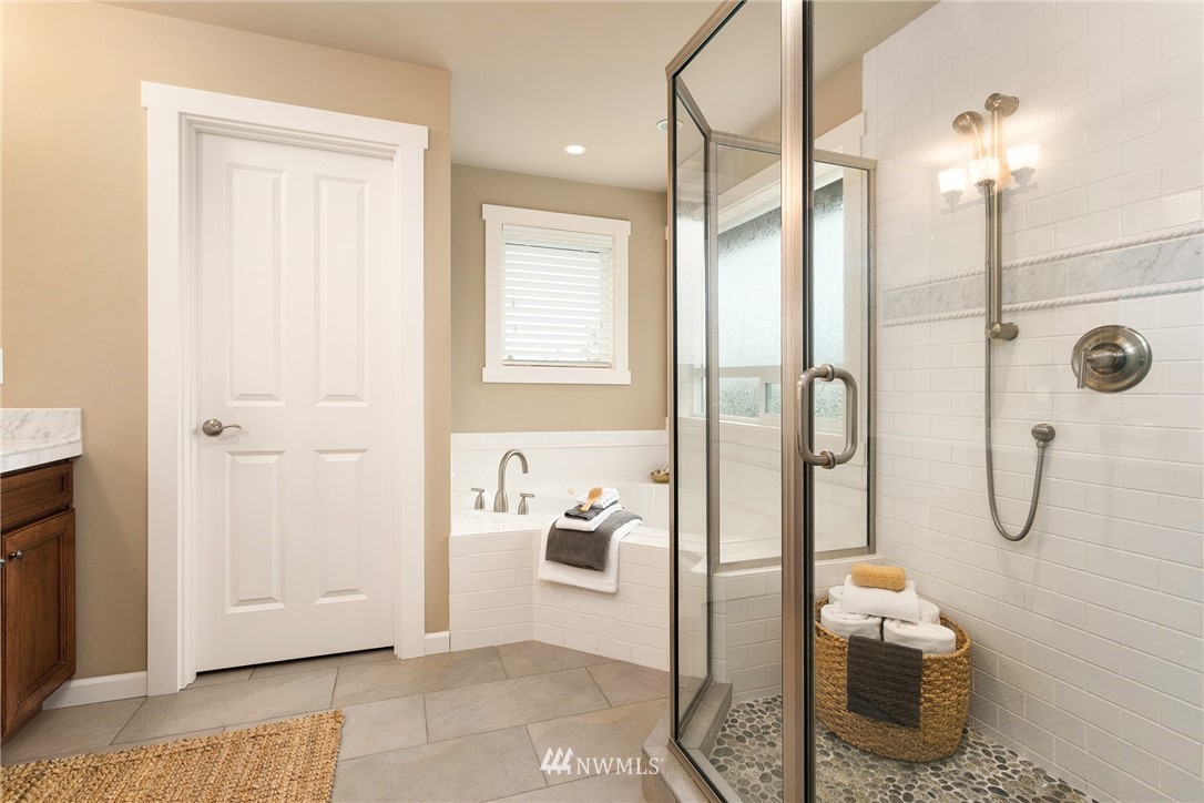 110 N 50th Street Seattle, WA 98103 - Photo 18 of 25 a bathroom with a shower