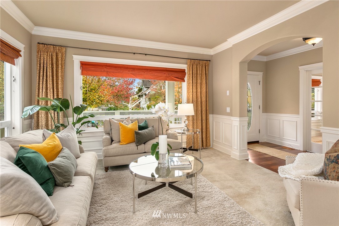 110 N 50th Street Seattle, WA 98103 - Photo 4 of 25 a living room with furniture and a large window