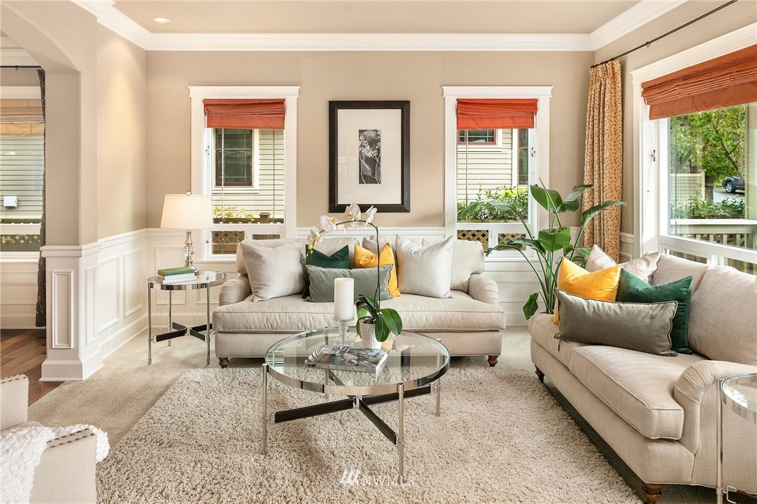 110 N 50th Street Seattle, WA 98103 - Photo 5 of 25 a living room with furniture and a large window
