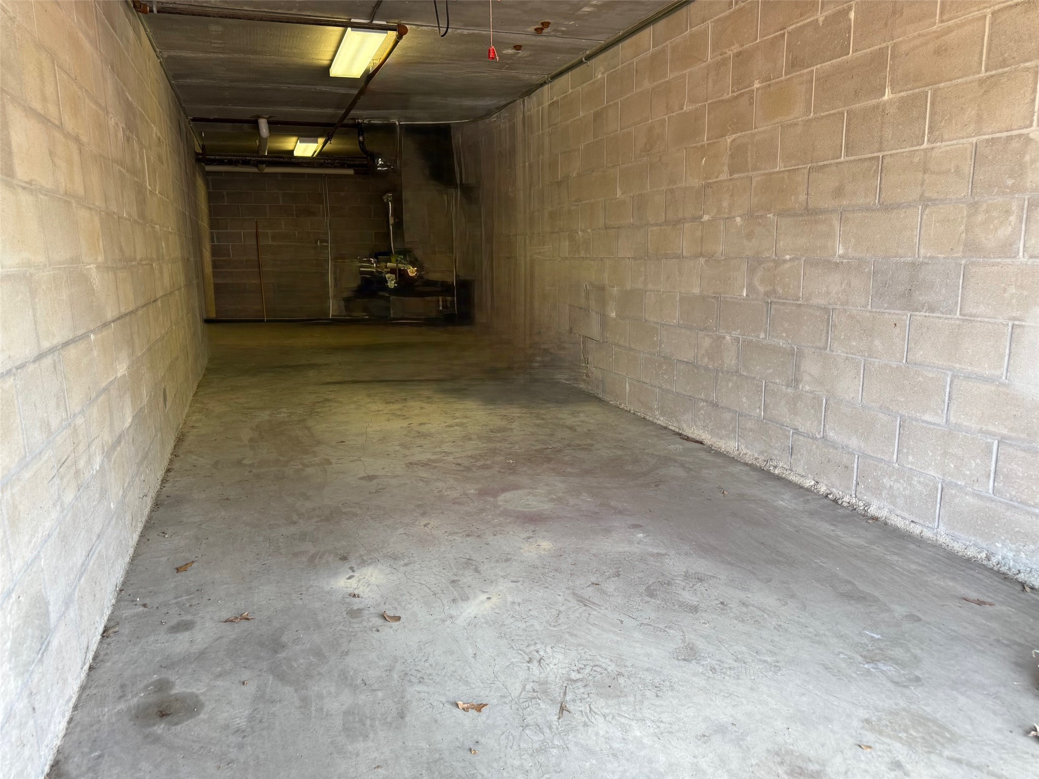 1722 Washington Avenue, Unit D Houston, TX 77007 - Photo 23 of 28 Long tandem 2 car garage (approximately 40x9) is perfect for your vehicle and to store items.
