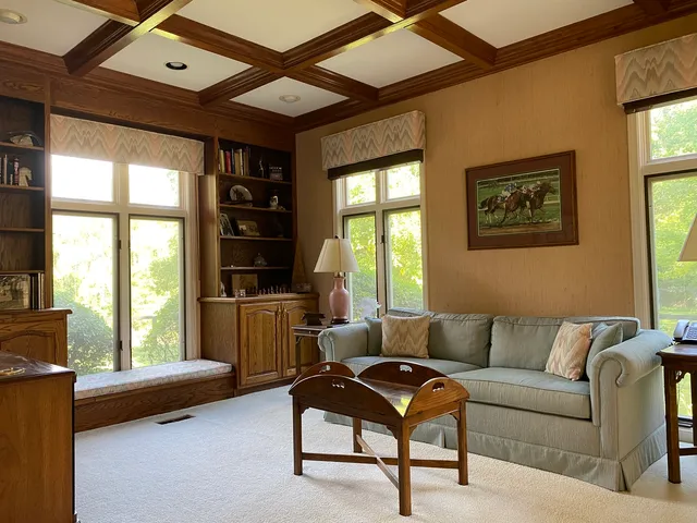 a spacious bathroom with a large tub and shower