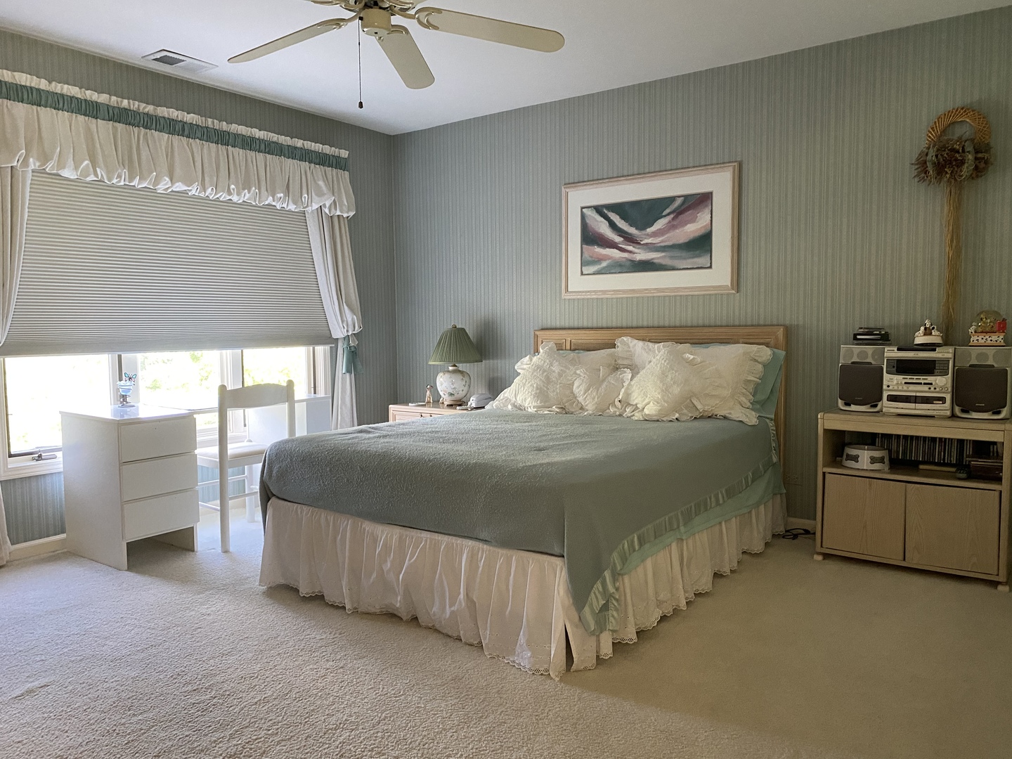 5801 Port Clinton Road Long Grove, IL 60047 - Photo 20 of 38 a bedroom with a bed and a chandelier