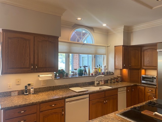5801 Port Clinton Road Long Grove, IL 60047 - Photo 5 of 38 a kitchen with a sink stove and cabinets