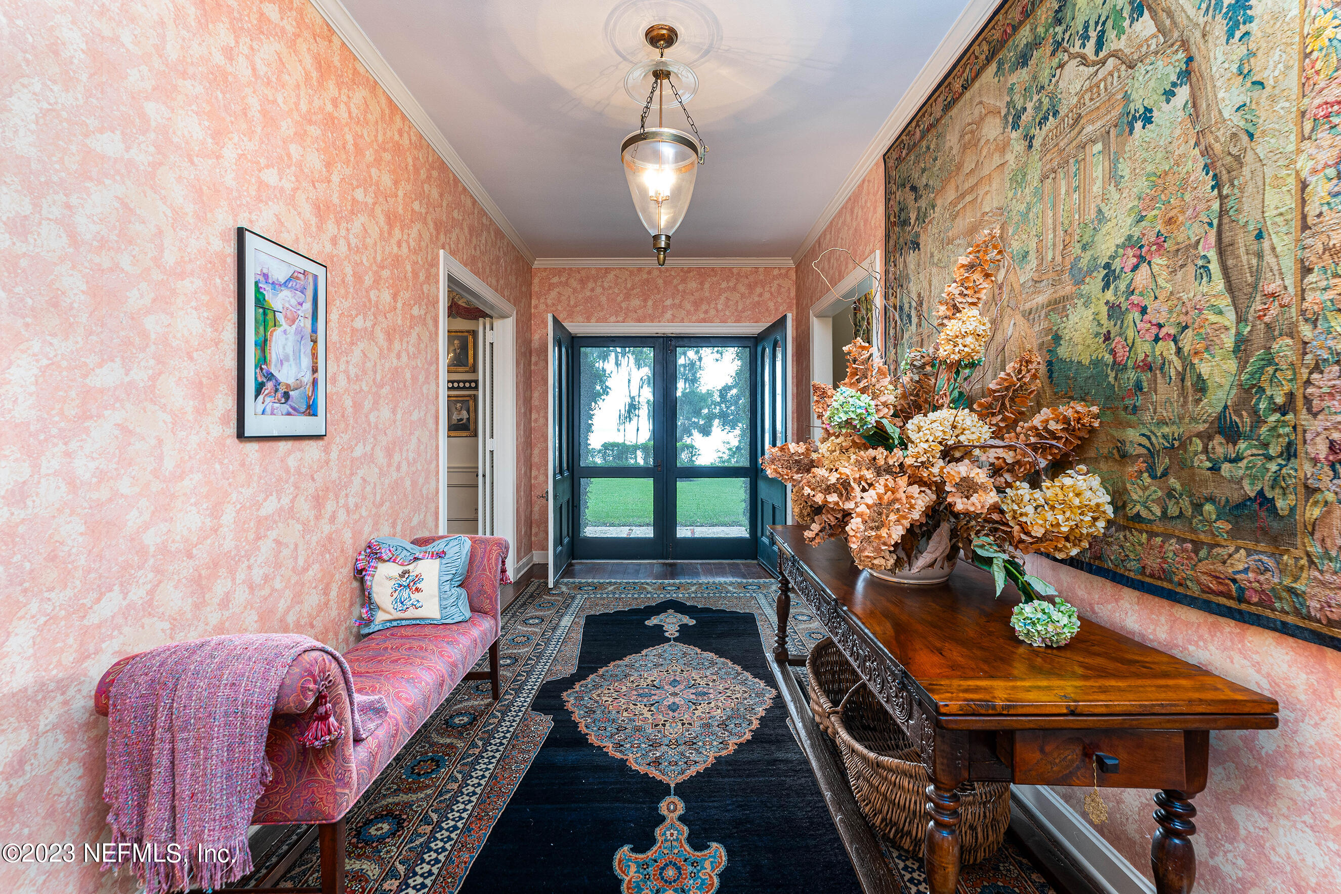6975 Old Church Road Fleming Island, FL 32003 - Photo 11 of 53 a living room with furniture and a chandelier