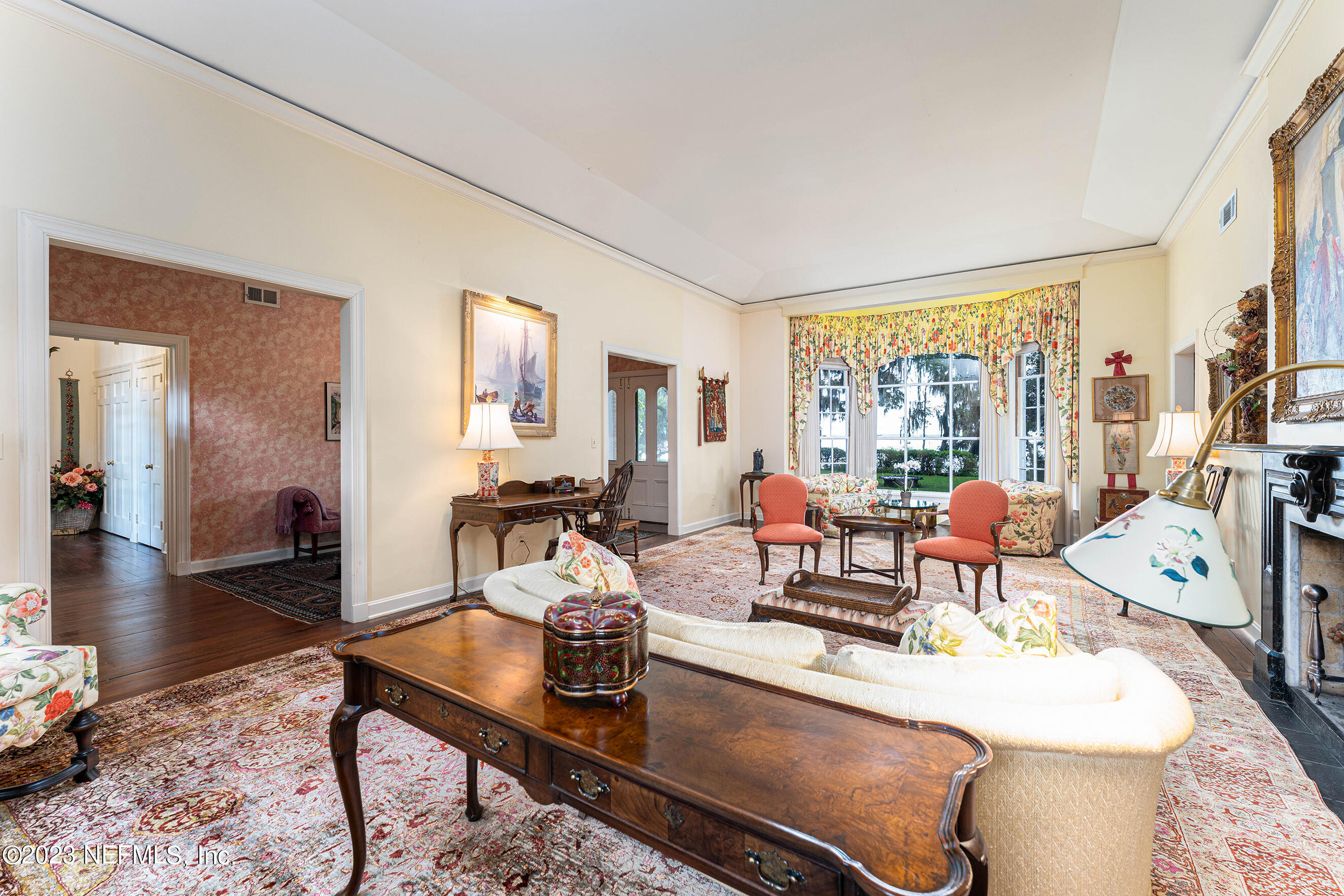 6975 Old Church Road Fleming Island, FL 32003 - Photo 12 of 53 a living room with furniture and a large window