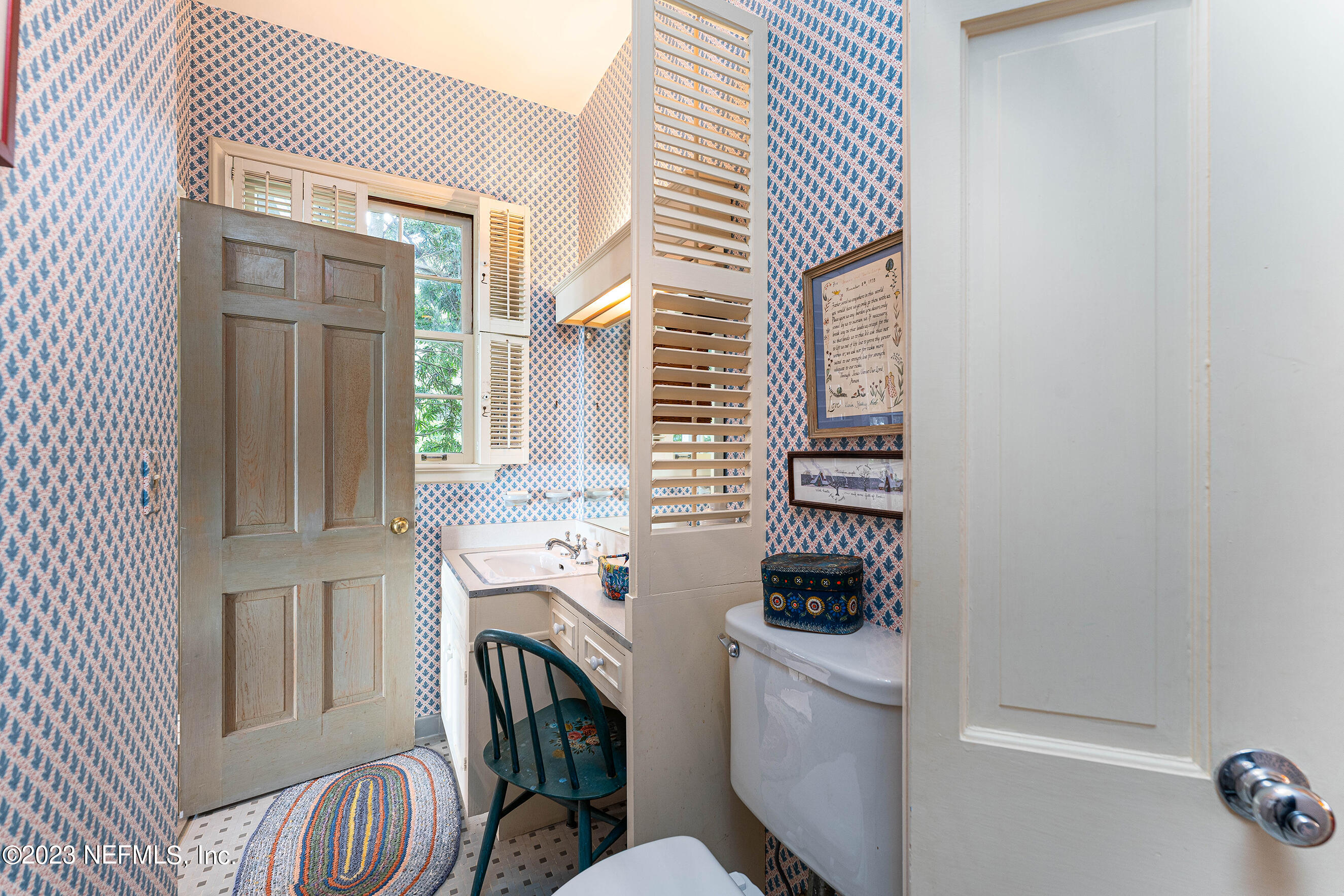 6975 Old Church Road Fleming Island, FL 32003 - Photo 16 of 53 a view of a kitchen and utility room