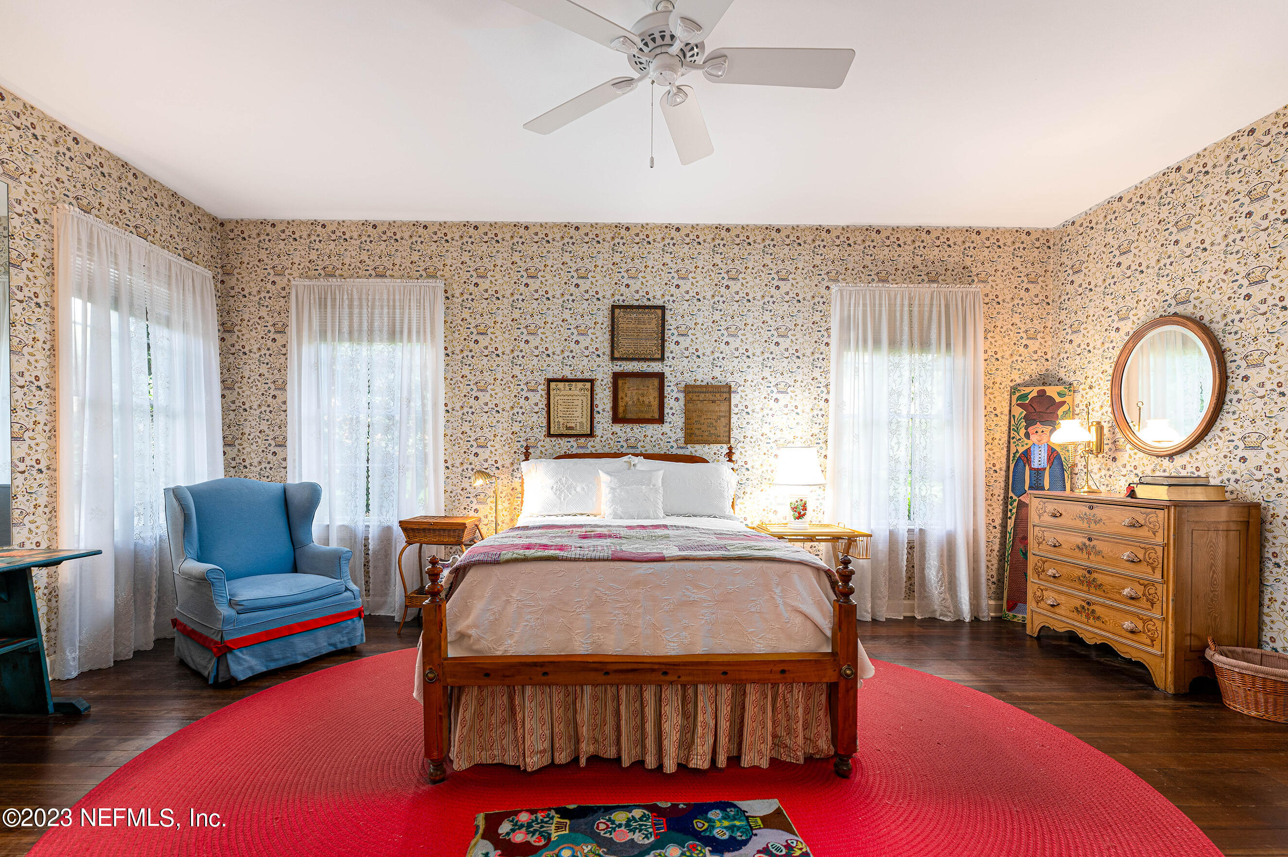 6975 Old Church Road Fleming Island, FL 32003 - Photo 19 of 53 a bedroom with a bed a couch and dresser