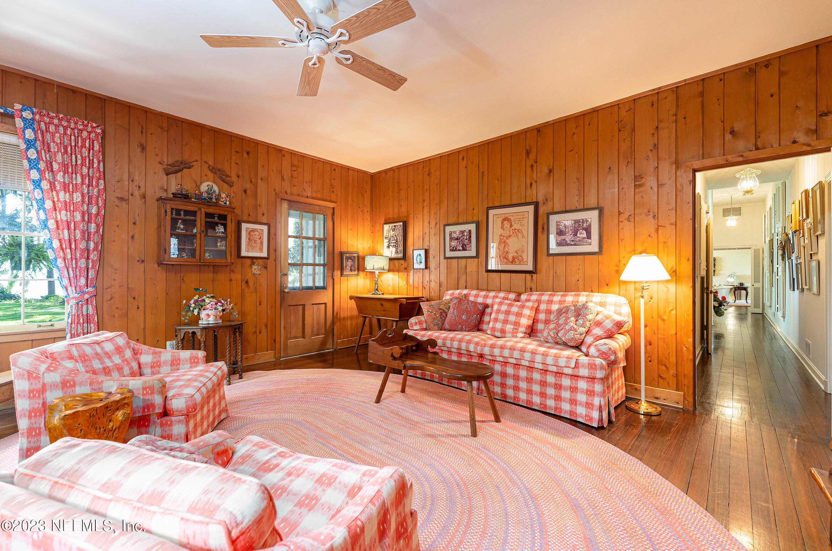 6975 Old Church Road Fleming Island, FL 32003 - Photo 23 of 53 a bedroom with a bed and wooden floor