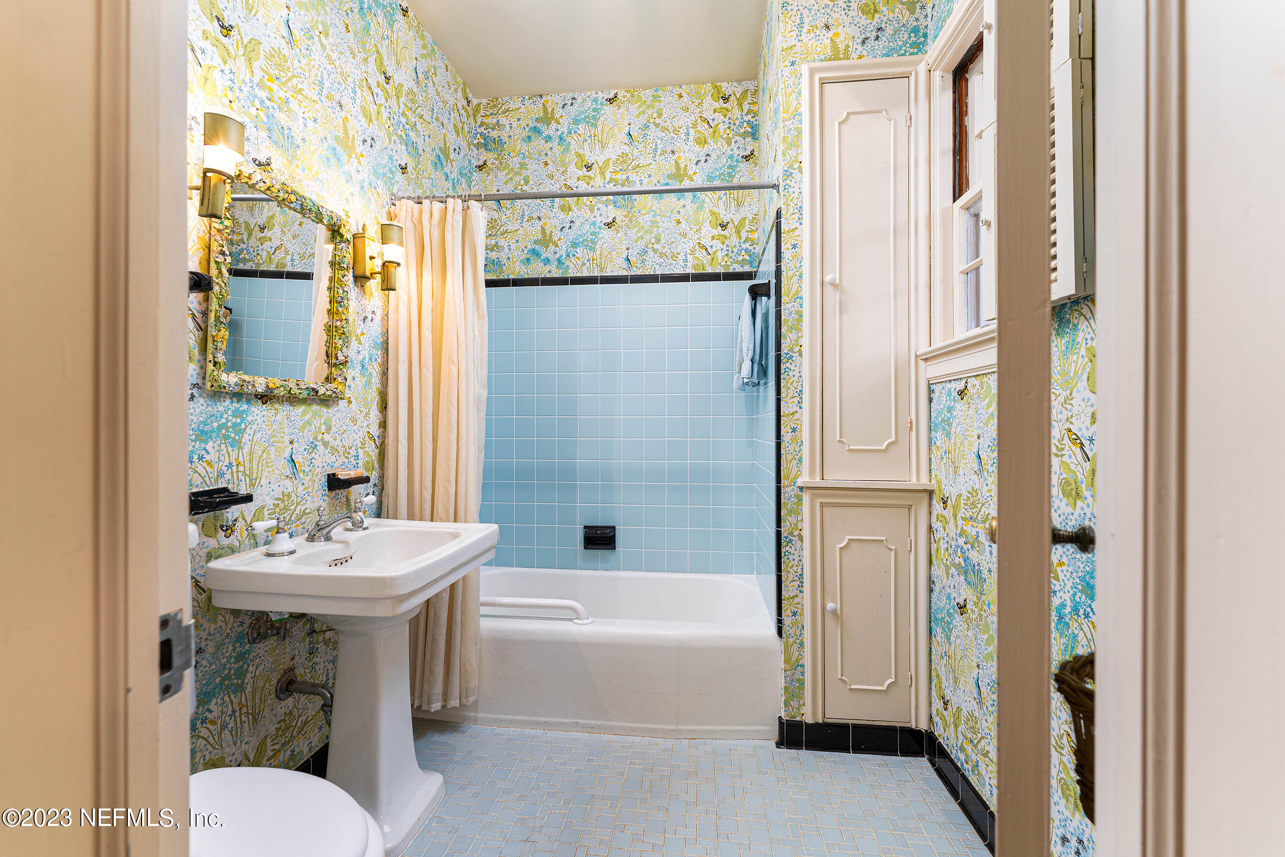 6975 Old Church Road Fleming Island, FL 32003 - Photo 28 of 53 a bathroom with a sink and a mirror