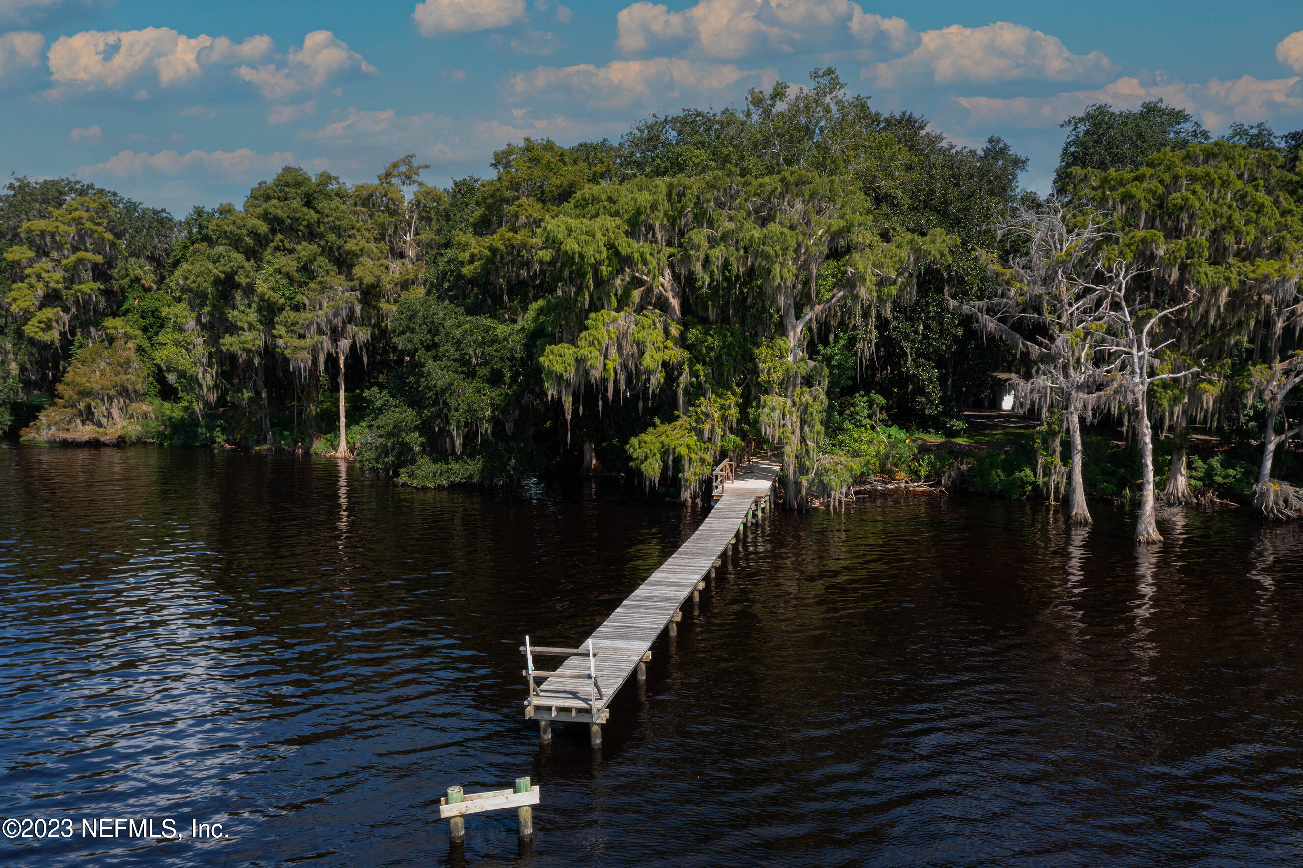 6975 Old Church Road Fleming Island, FL 32003 - Photo 3 of 53 a view of river covered by trees and buildings