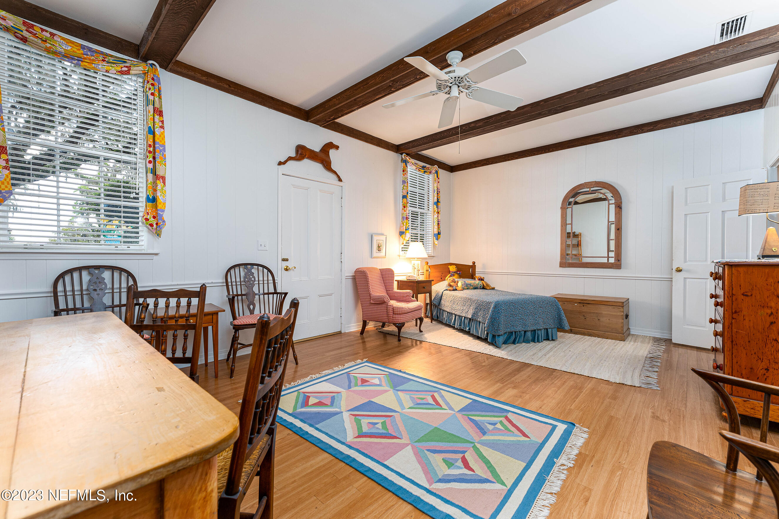6975 Old Church Road Fleming Island, FL 32003 - Photo 34 of 53 a living room with furniture a rug and a window