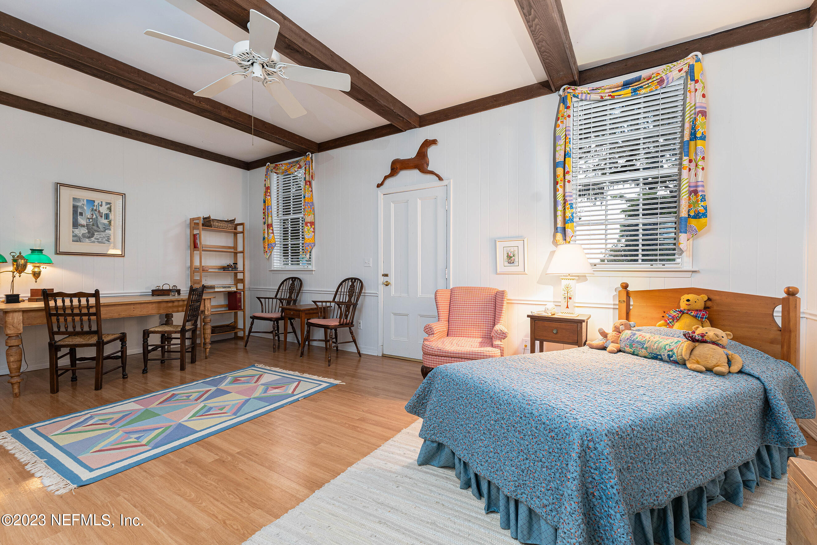 6975 Old Church Road Fleming Island, FL 32003 - Photo 35 of 53 a bedroom with furniture and a large window
