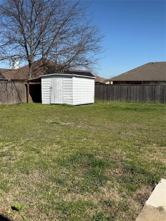 902 North 4th Street Wills Point, TX 75169 - Photo 12 of 15 a view of a backyard