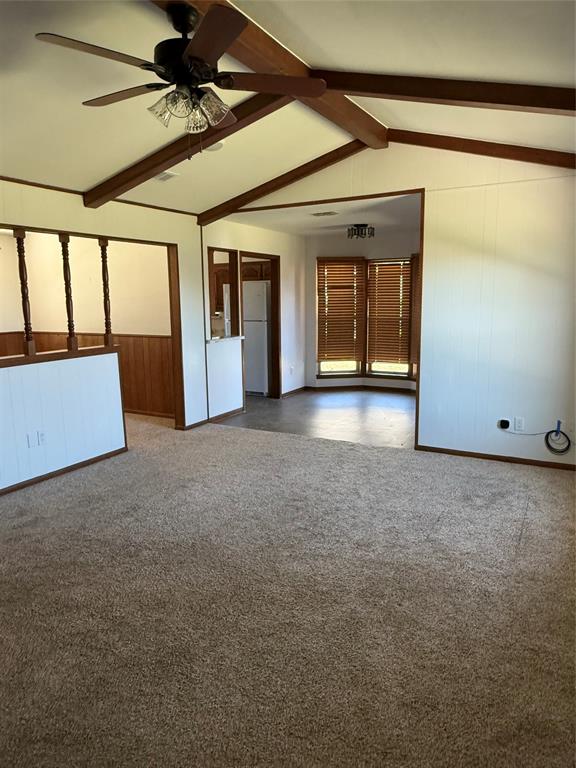 902 North 4th Street Wills Point, TX 75169 - Photo 3 of 15 a view of a livingroom with an empty space and a window