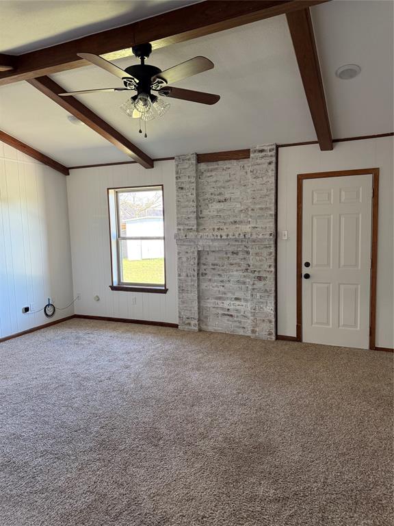 902 North 4th Street Wills Point, TX 75169 - Photo 4 of 15 a view of a livingroom with a ceiling fan and window