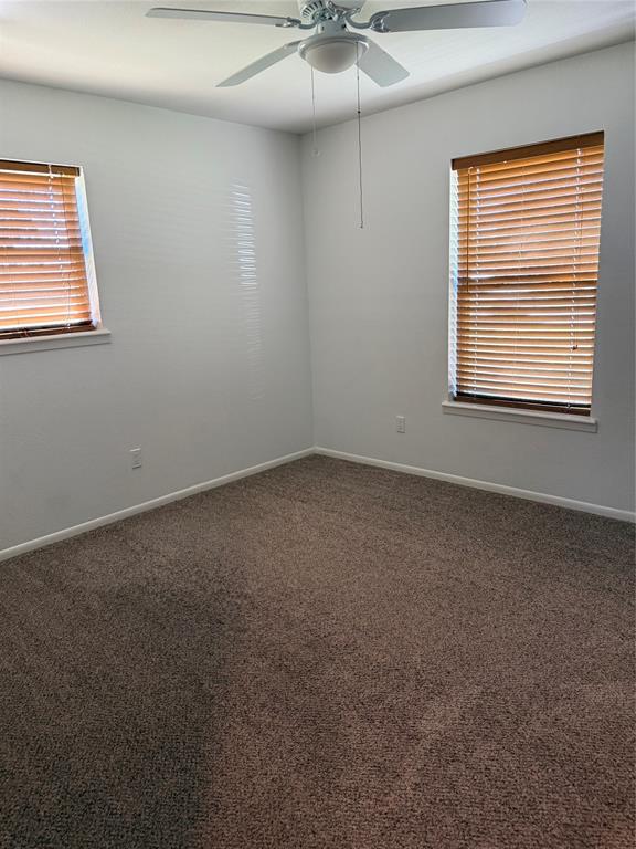 902 North 4th Street Wills Point, TX 75169 - Photo 9 of 15 an empty room with a window