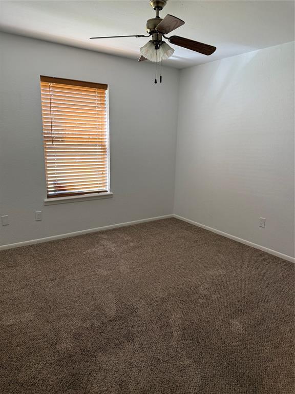 902 North 4th Street Wills Point, TX 75169 - Photo 10 of 15 an empty room with a window