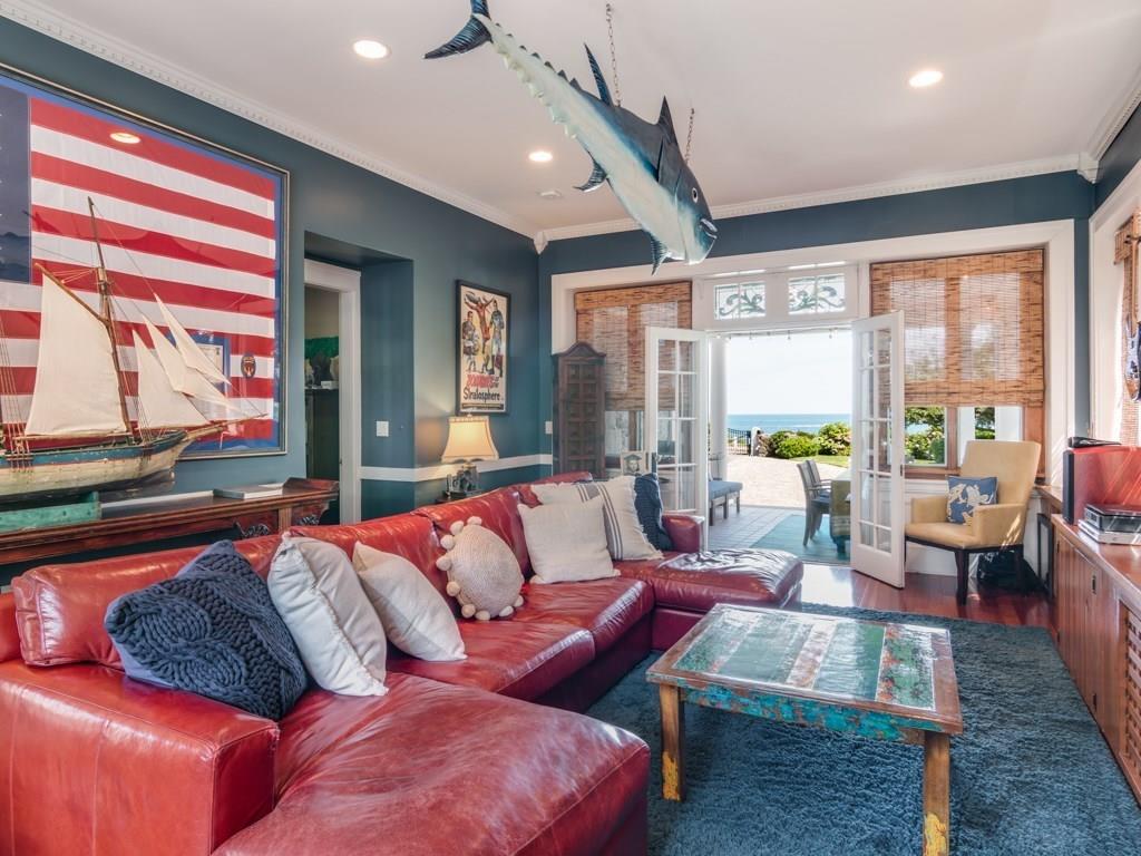 391 Nahant Road Nahant, MA 01908 - Photo 12 of 42 a living room with furniture and a large window