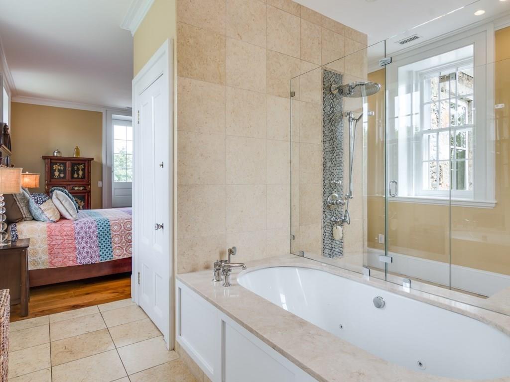 391 Nahant Road Nahant, MA 01908 - Photo 18 of 42 a spacious bathroom with a tub shower and sink