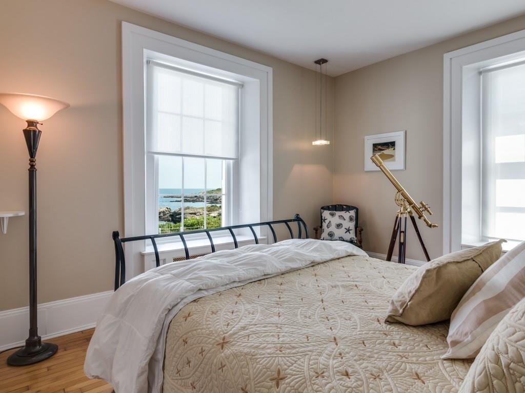 391 Nahant Road Nahant, MA 01908 - Photo 23 of 42 a bedroom with a bed and a window