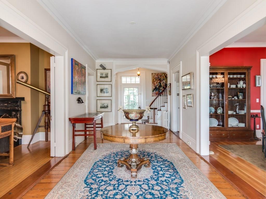 391 Nahant Road Nahant, MA 01908 - Photo 3 of 42 a living room with furniture a rug and a table