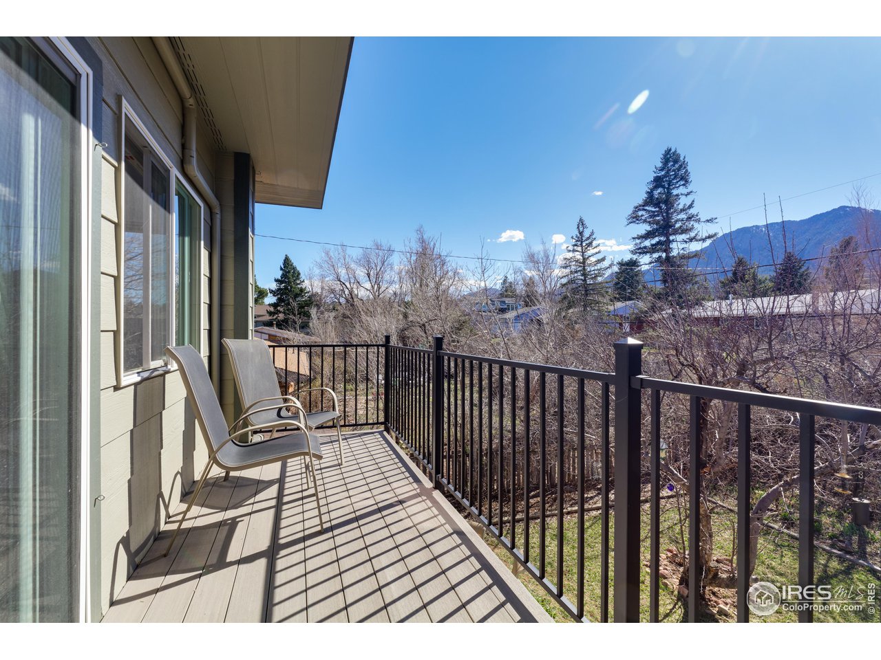 1345 Georgetown Road Boulder, CO 80305 - Photo 17 of 38 Balcony with a gorgeous west facing backdrop off of upper family room/study