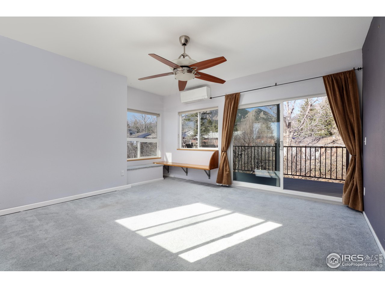 1345 Georgetown Road Boulder, CO 80305 - Photo 28 of 38 Upper family room with incredible treehouse views and balcony