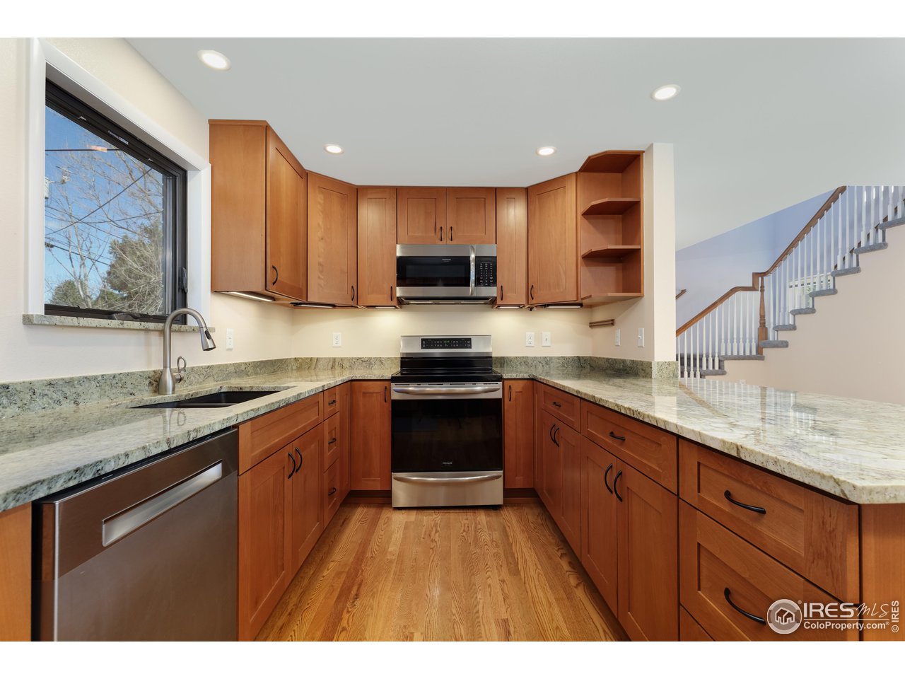 1345 Georgetown Road Boulder, CO 80305 - Photo 5 of 38 Gorgeous, one of a kind garnet granite countertops in the newly remodeled kitchen