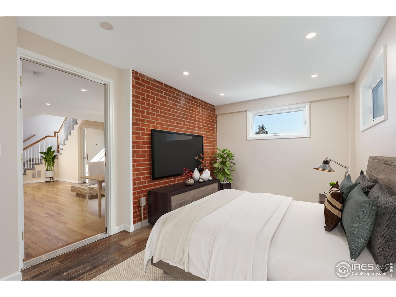 1345 Georgetown Road Boulder, CO 80305 - Photo 8 of 38 mother-in-law suite/bedroom 3 main floor bedroom 3 with 3/4 bathroom, laundry closet and separate exterior entry; makes a great tv room or office, too.