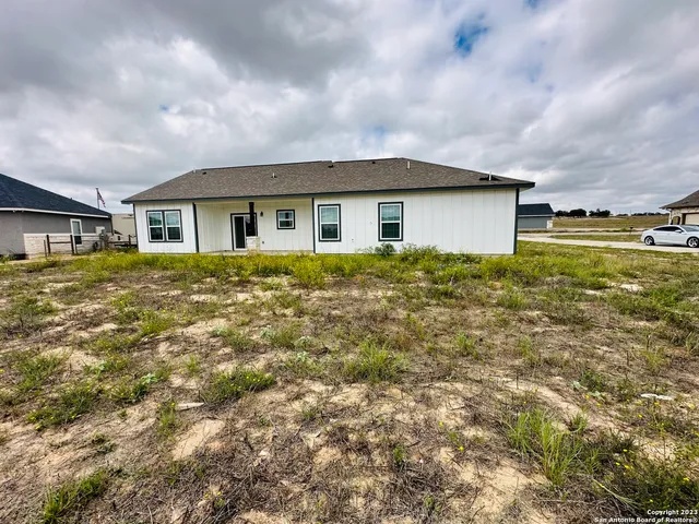 a house view with a garden space