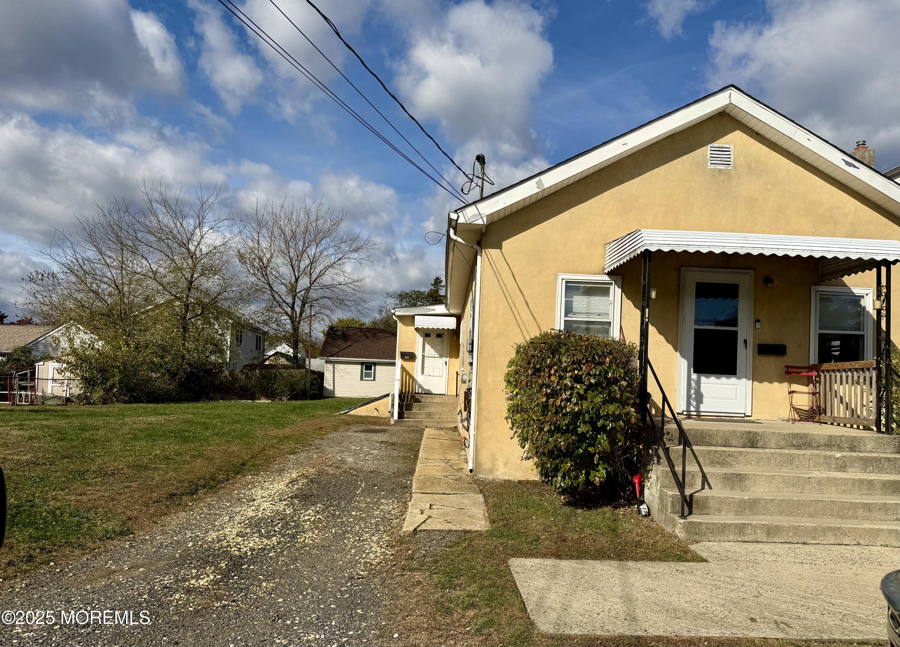 672 Shore Concourse, Unit B Keyport, NJ 07735 - Photo 1 of 10 a front view of a house with garden