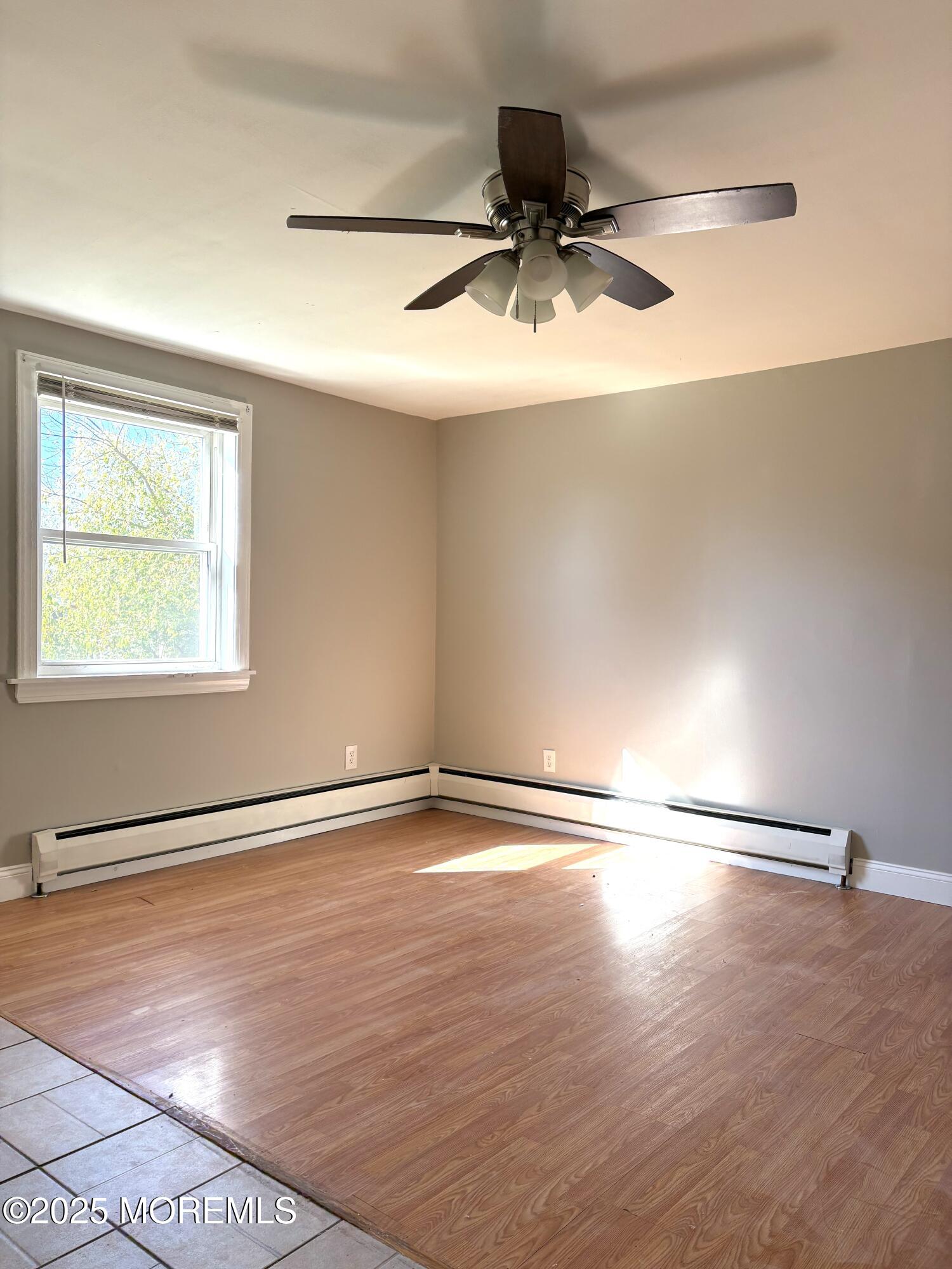 672 Shore Concourse, Unit B Keyport, NJ 07735 - Photo 9 of 10 a view of an empty room and a window