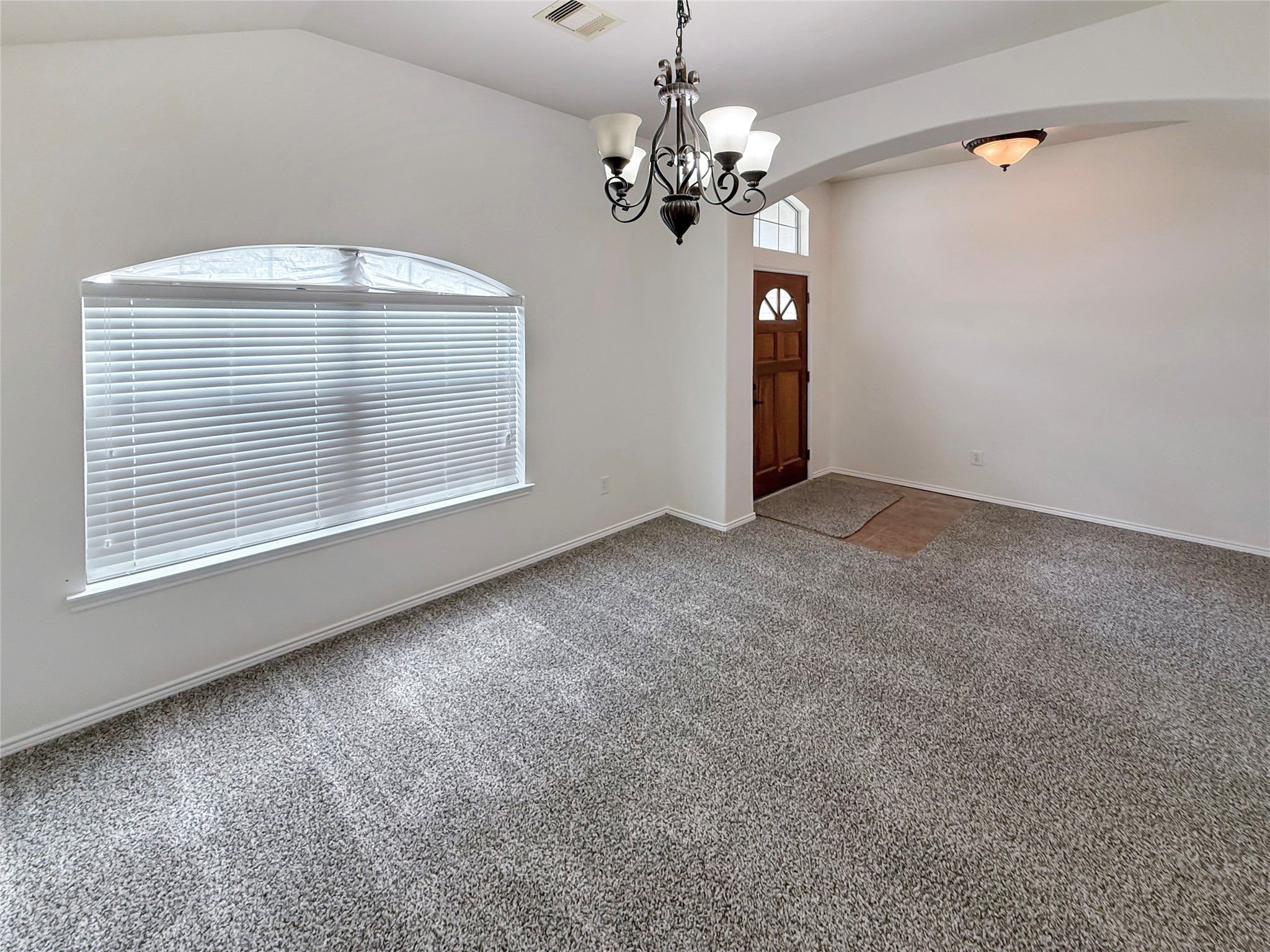 19531 Village Of Bridgestone Lane Spring, TX 77379 - Photo 4 of 40 a view of an empty room with a window