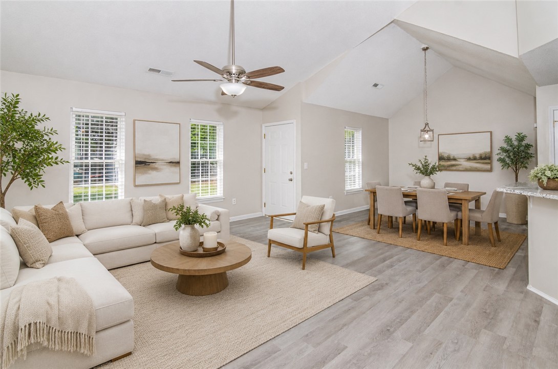 102 Hawk Ridge Drive Anderson, SC 29621 - Photo 36 of 38 Bright and airy open concept living and dining spaces offer a relaxed and inviting atmosphere.