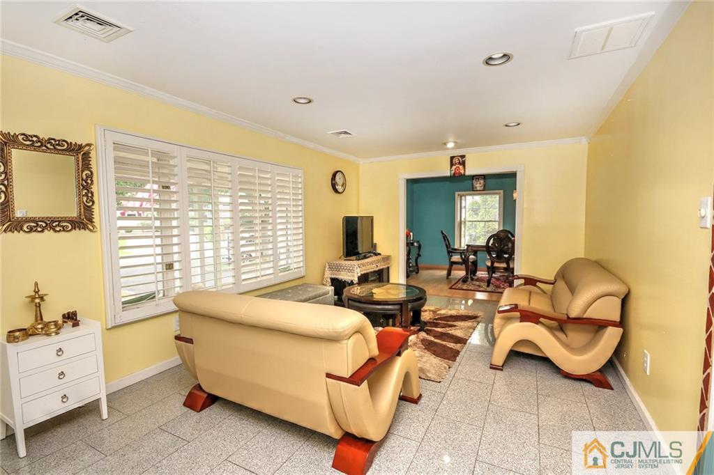 18 Harvard Road Old Bridge, NJ 08859 - Photo 17 of 24 a living room with furniture and a large window
