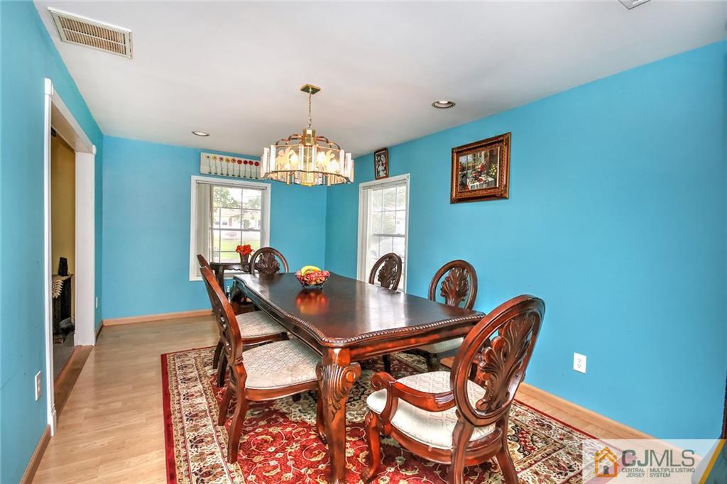 18 Harvard Road Old Bridge, NJ 08859 - Photo 22 of 24 a table and chairs in a room