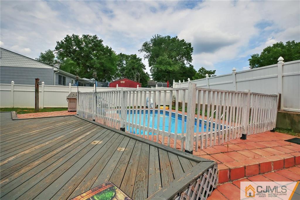 18 Harvard Road Old Bridge, NJ 08859 - Photo 23 of 24 a balcony with wooden floor and city view