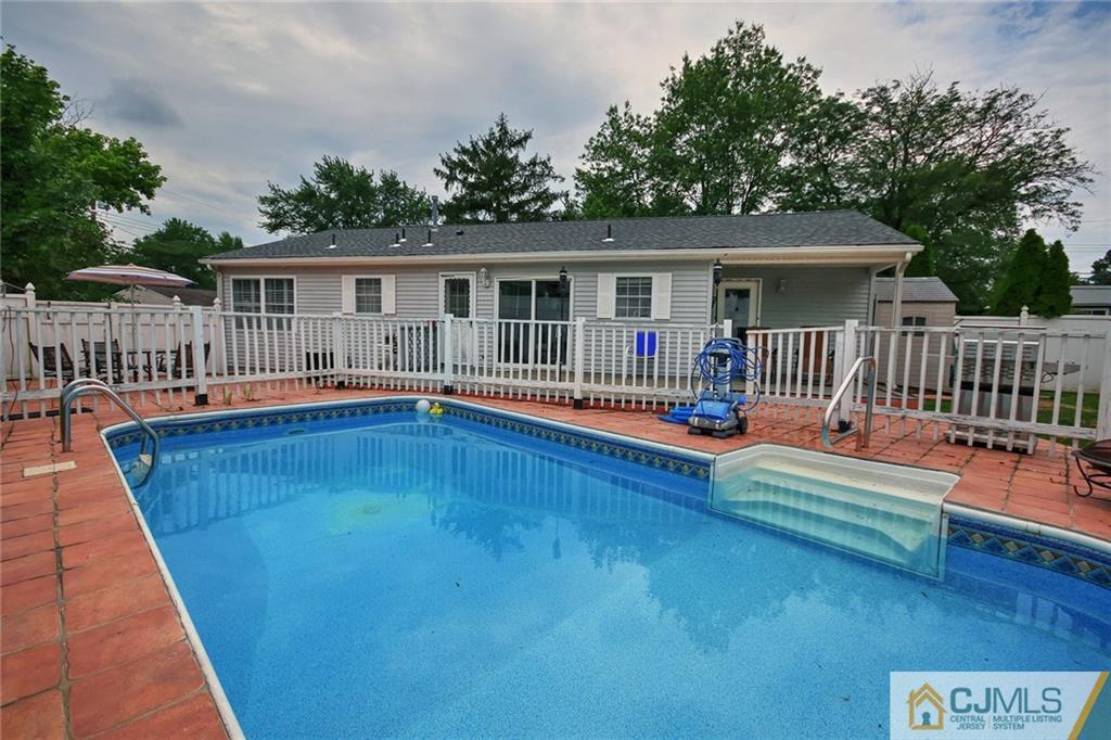 18 Harvard Road Old Bridge, NJ 08859 - Photo 24 of 24 a view of a house with swimming pool and porch