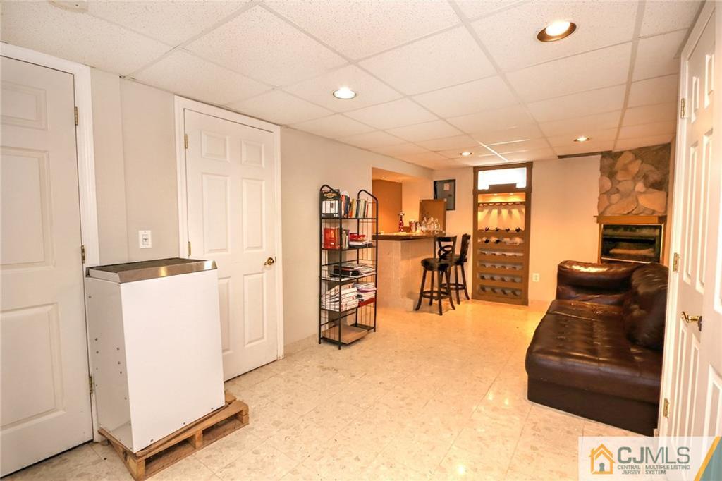 18 Harvard Road Old Bridge, NJ 08859 - Photo 6 of 24 a livingroom with furniture and a flat screen tv
