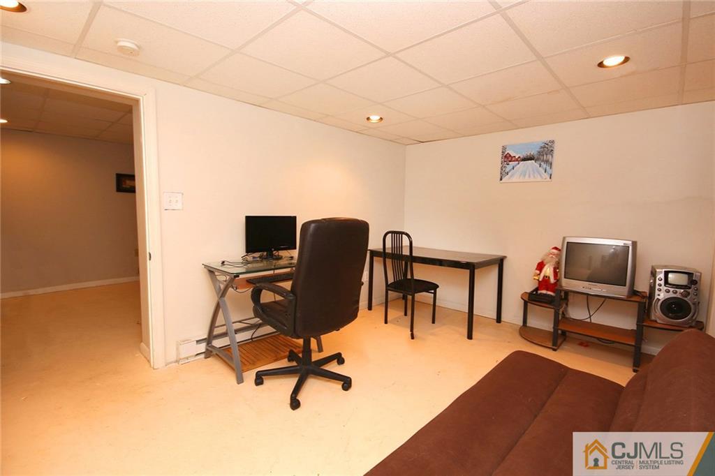 18 Harvard Road Old Bridge, NJ 08859 - Photo 7 of 24 a workspace with furniture