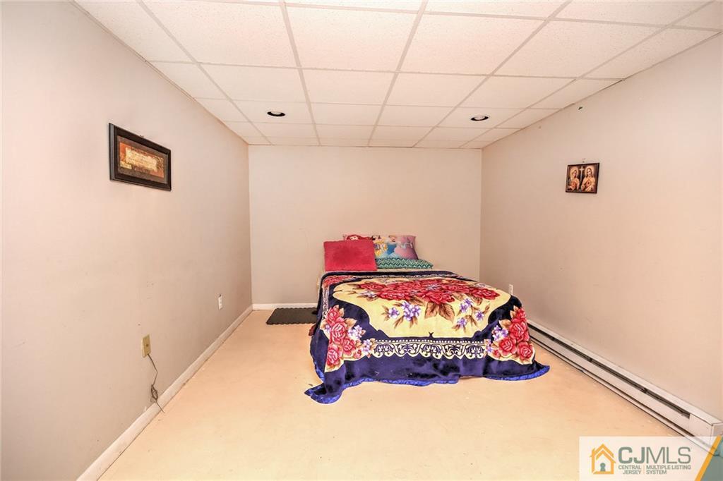 18 Harvard Road Old Bridge, NJ 08859 - Photo 8 of 24 a room with a wooden floor