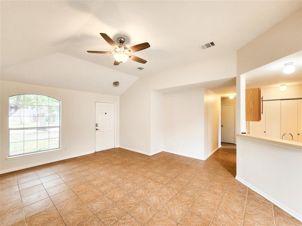 19331 River Bottom Road Katy, TX 77449 - Photo 14 of 23 a view of an empty room with a window