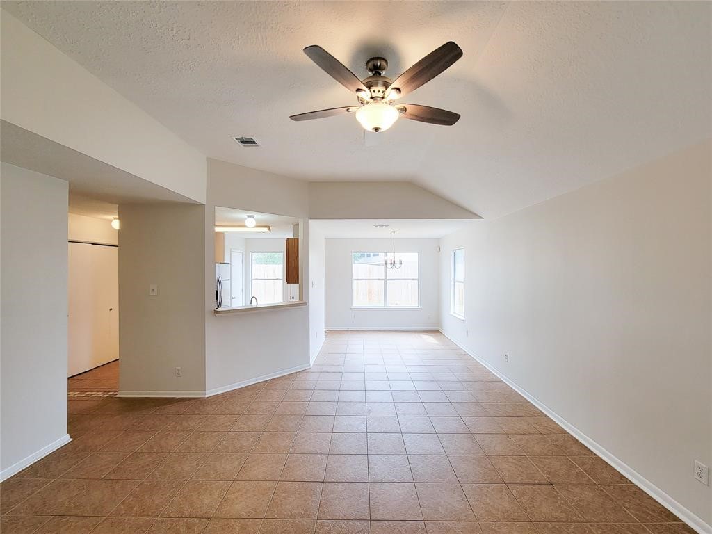 19331 River Bottom Road Katy, TX 77449 - Photo 15 of 23 a view of an empty room with a window