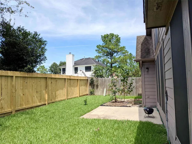 a view of a backyard with plants
