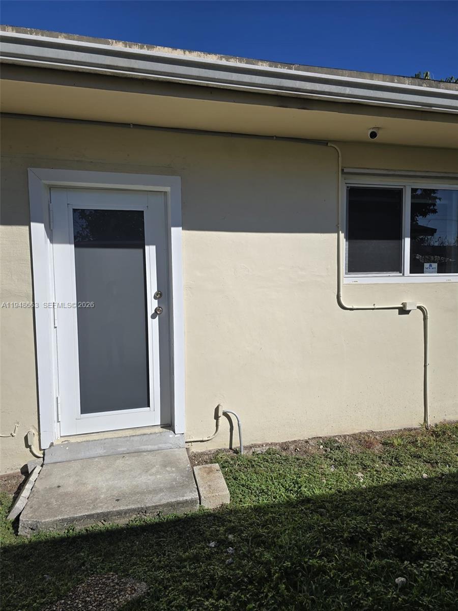 15764 Southwest 303rd Terrace Homestead, FL 33033 - Photo 13 of 14 a backyard of a house