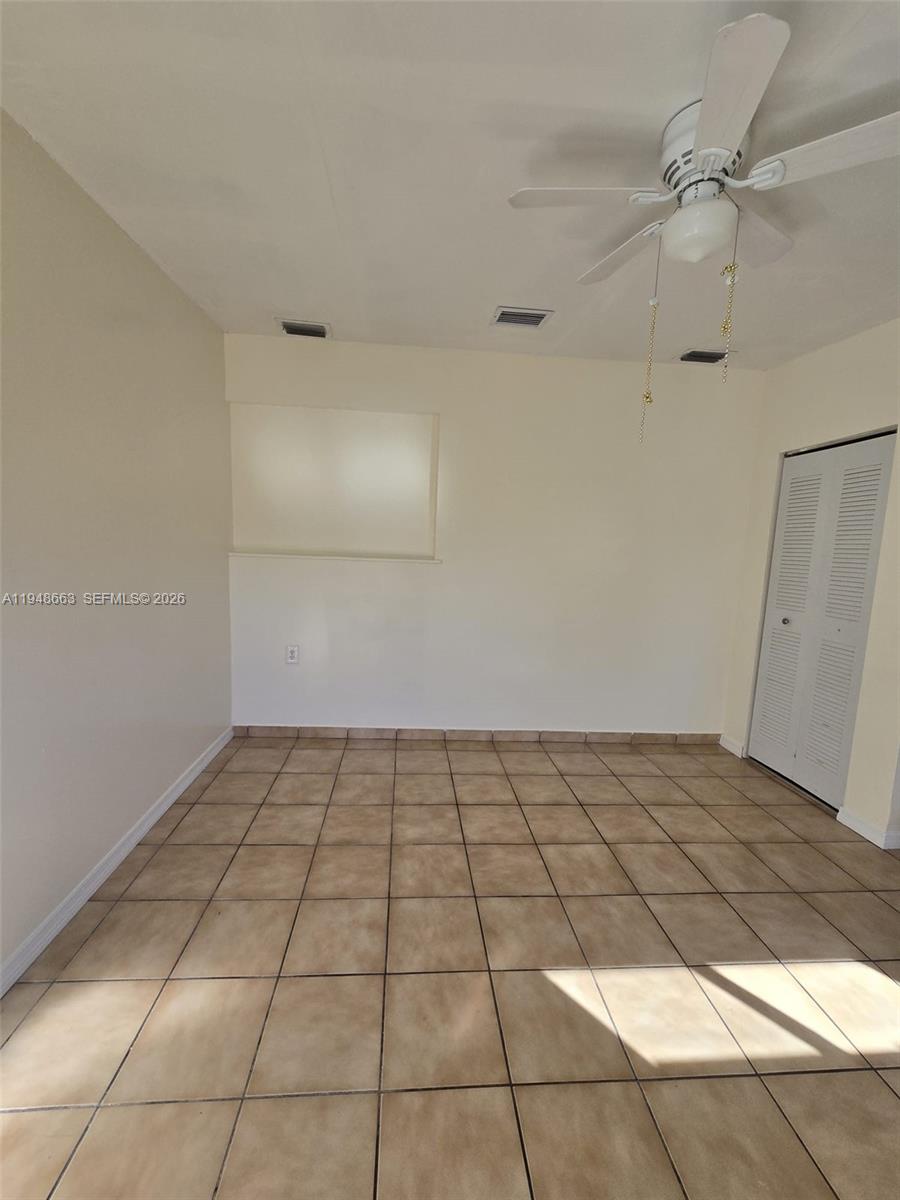 15764 Southwest 303rd Terrace Homestead, FL 33033 - Photo 2 of 14 a view of an empty room