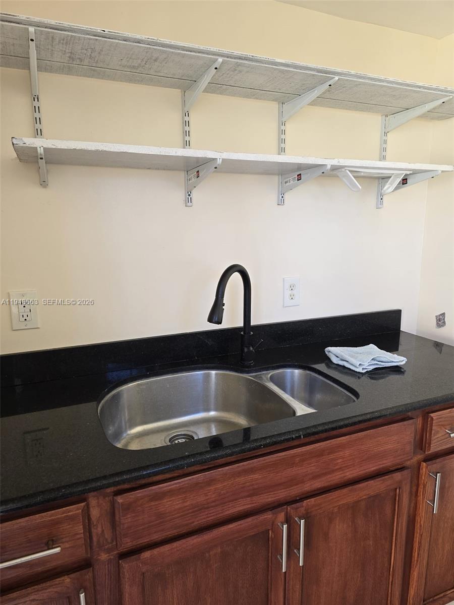 15764 Southwest 303rd Terrace Homestead, FL 33033 - Photo 5 of 14 a close view of sink and tap